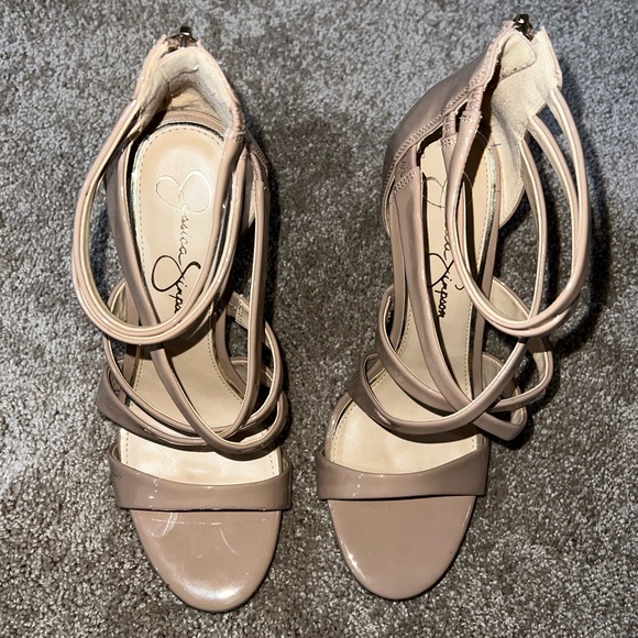 Never worn strappy 4.5 inch heels with a zipper back. Fits true to size. - Picture 3 of 4